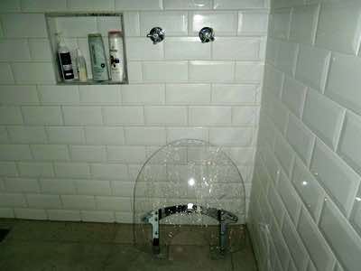 cleaning bike parts in the shower