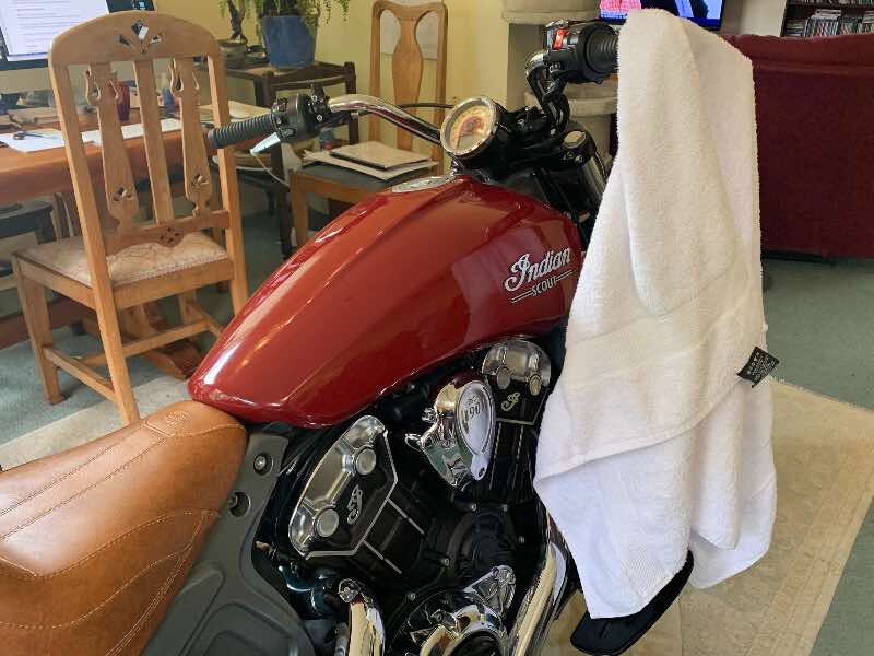 motorcycle as towel rack